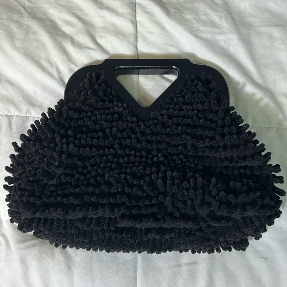 Black shag chenille clutch handbag. With crossbody strap.